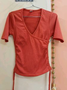 Coral Ribbed V-Neck Ruched Top