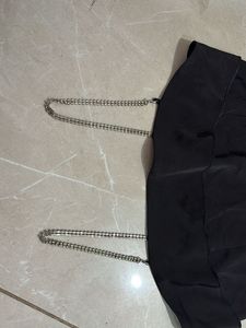 Chic Black Off-Shoulder Top with Chain Detail