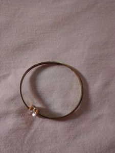 Elegant Gold Bangle with Crystal Accent