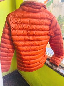 Orange puffer packable jacket