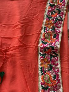 Vibrant Orange Embroidered Saree with Green Blouse