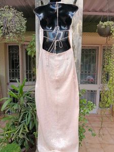 Halter neck sleek beige sequinned gown