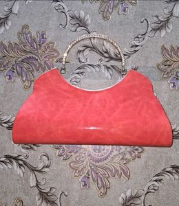 Elegant Coral Clutch Bag with Crystal Handle