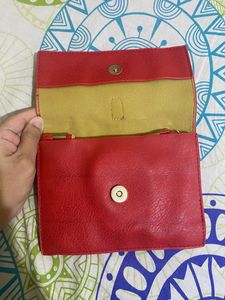 Red Ring Handle Clutch