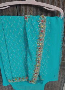 Stunning Embroidered Teal Saree