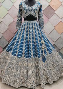 Exquisite Teal Embellished Lehenga Choli