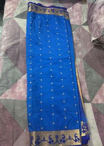 Vibrant Blue Silk Saree with Peacock Motif