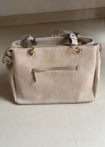 Stylish Beige Textured Handbag with Butterfly Char