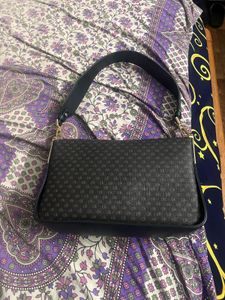 Sleek Black Handbag