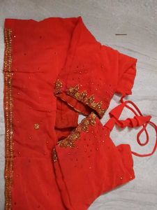 Elegant Orange stone Saree with stitched blo