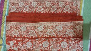 Elegant Orange Embroidered Saree