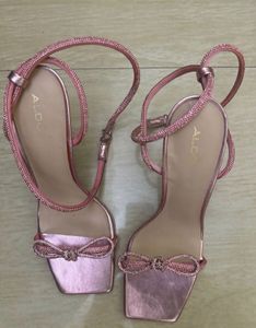 Aldo Pink Metallic Bow Heels