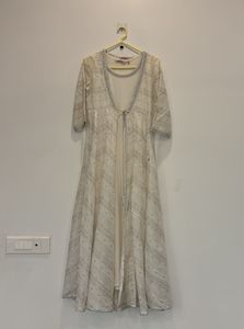 Elegant White Ethnic Gown with Silver Embellishmen
