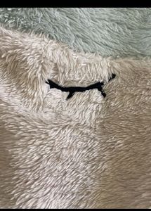 Cozy Fuzzy Sleepy Eye Sweater