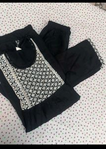 Elegant Black Kurta Set with Embellished Neckline
