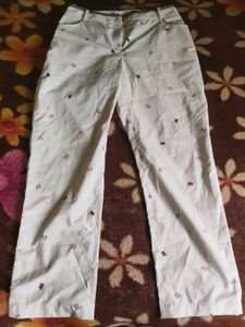 Cream Crown Print Straight Leg Pants
