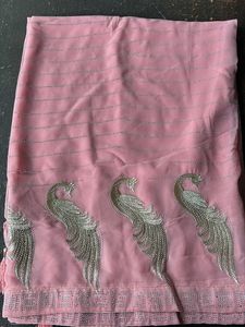 Elegant Pink Saree with Peacock Motif