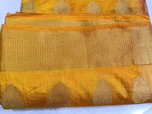 Vibrant Yellow Saree with Brocade Blouse
