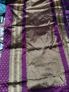 Elegant Purple Saree with Gold Polka Dots
