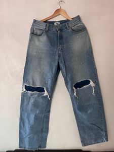 Distressed Blue Denim Jeans