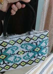Exquisite Beaded Handbag with Geometric Pattern