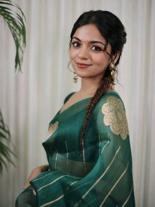 Elegant Green Saree with Floral Motifs