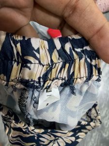 Leaf Print Flowy boot cut pant