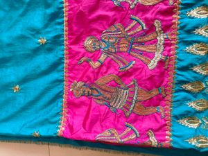Vibrant Silk Saree with Embroidered Motifs
