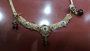 Elegant Gold-Toned Necklace Set with Stones