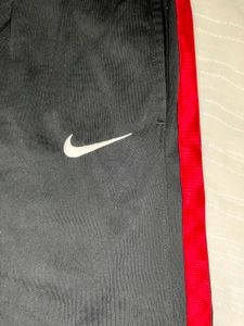 Nike Track Pants with Red Stripe