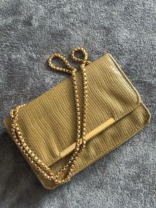 Stylish Textured sling with Gold Chain