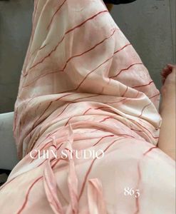 Flowy Maxi Dress with Tie Detail by Chin studio