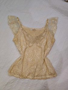 Sheer Lace Peplum Top