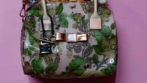 Glossy PolyVinyl material Floral Print Handbag