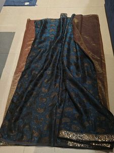 Elegant Teal & Gold Paisley Saree