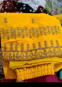 New yellow shuit(never used)