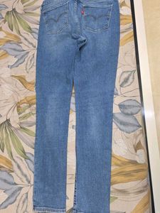 Distressed Blue Denim Jeans