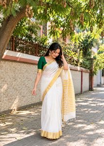 Elegant White & Gold Saree