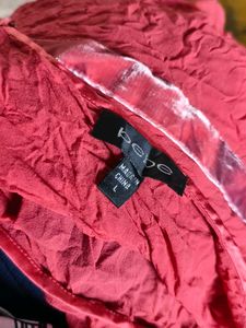 I. Chic Coral Wrap Top
