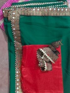 Elegant Green Saree with Mirror Work Border