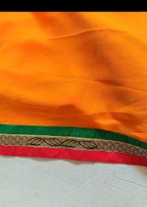 Vibrant Orange Saree with Golden Border