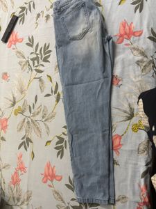 Distressed Light Wash "FREE" Jeans