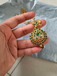 Stunning Gold Necklace with Green Stones