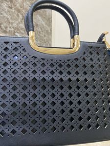 Graceful black Cut Work Women Handbag
