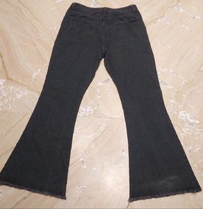 URBANIC HEAVY DISTRESSED BOOTCUT BLACK JEANS
