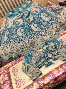 Exquisite Morni Blue Embellished Lehenga Set