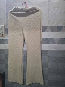 Cream High-Waisted Flare Pants