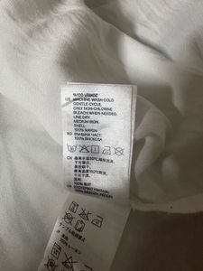 Sleeveless White Collared Shirt