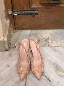 Elegant Slingback Heels with Embellished Detail