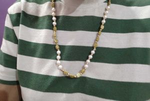 Elegant Pearl and Green Stone Necklace